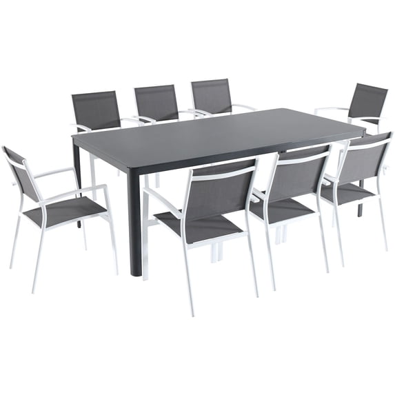 Hanover Fresno 9-Piece Outdoor Dining Set with 8 Sling Arm Chairs and a 42" x 83" Glass-Top Table