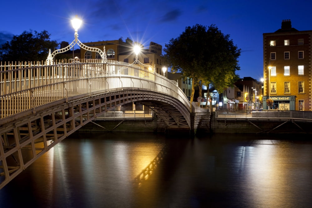 Hapenny Bridge lit up at dusk Liffey River Dublin Leinster Province Republic of Ireland Canvas Art - Panoramic Images (36 x 12)