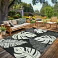 thumbnail image 1 of Haperlare 9'x18' Waterproof Outdoor Plastic Straw Rug, Modern Tropical Leaf Woven Carpet Reversible Patio Rug RV Camping Mat, Portable Outside Carpet for Deck Porch Yard Garden Balcony, Black Beige, 1 of 6