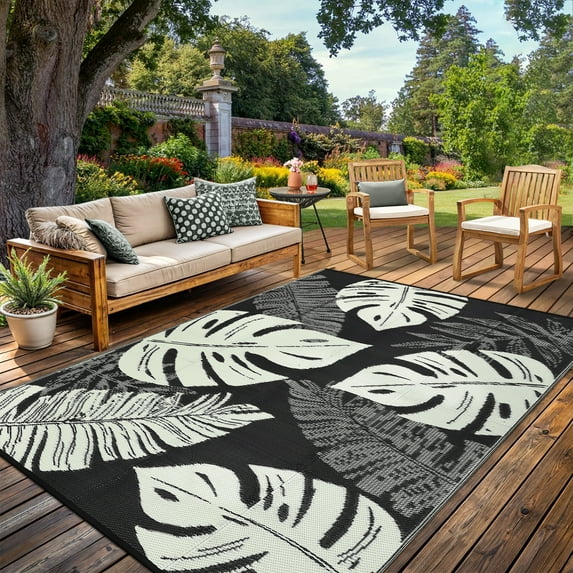 Haperlare 9'x18' Waterproof Outdoor Plastic Straw Rug, Modern Tropical Leaf Woven Carpet Reversible Patio Rug RV Camping Mat, Portable Outside Carpet for Deck Porch Yard Garden Balcony, Black Beige