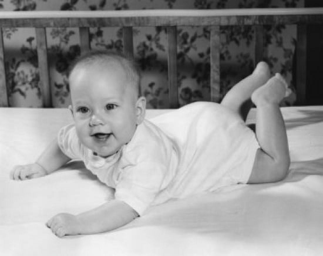 Happy baby lying on front Canvas Art - (24 x 36)