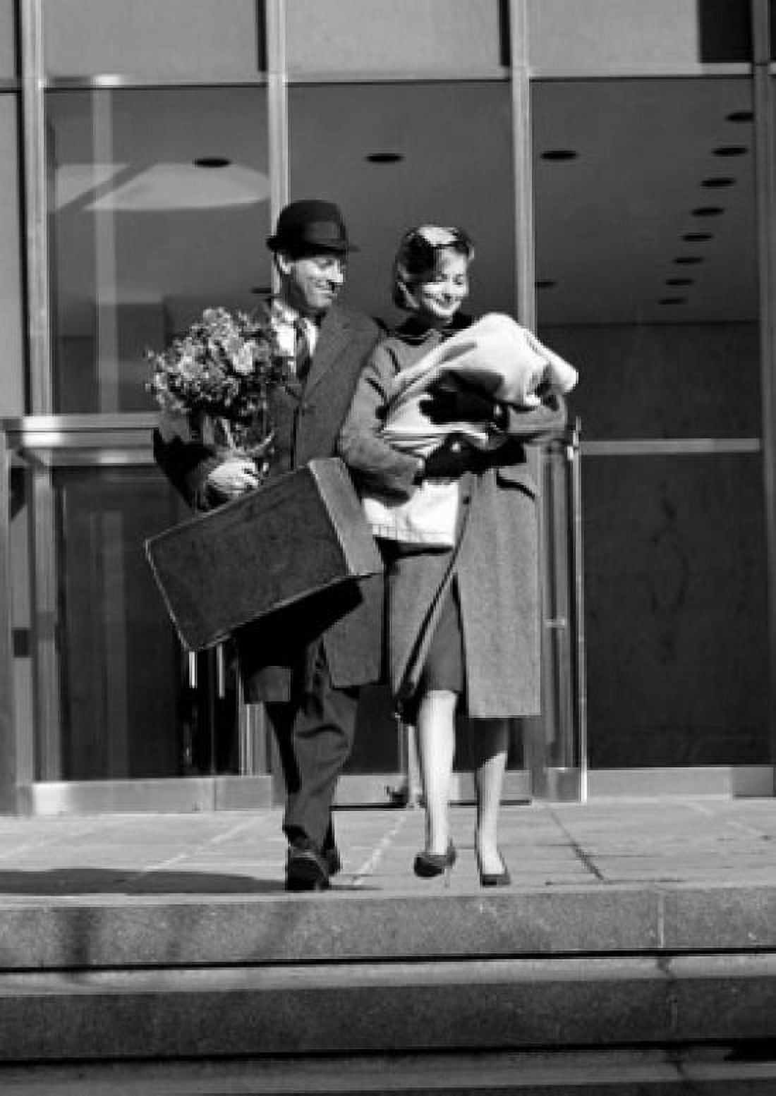 Happy couple leaving hospital with newborn baby Canvas Art - (24 x 36)