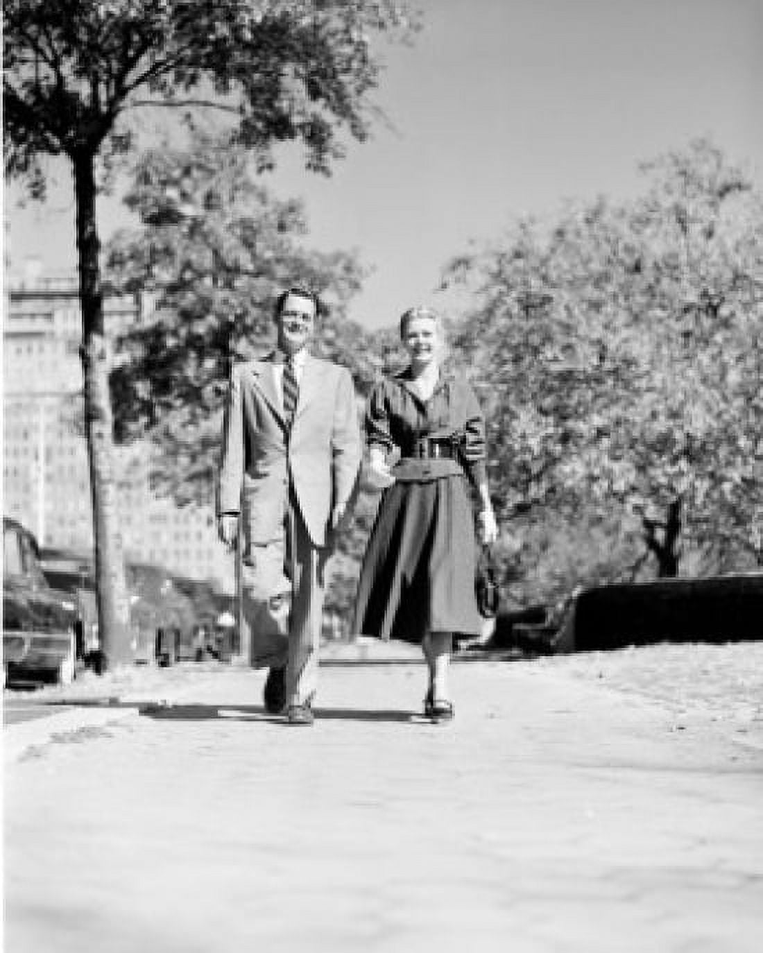 Happy couple walking Canvas Art - (24 x 36)