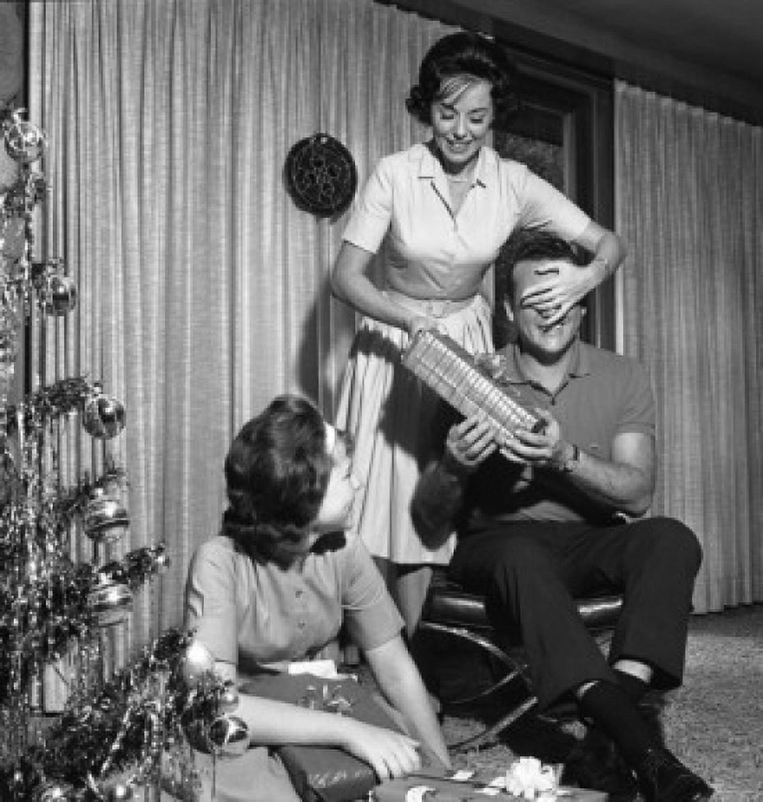 Happy family opening Christmas presents Canvas Art - (24 x 36)