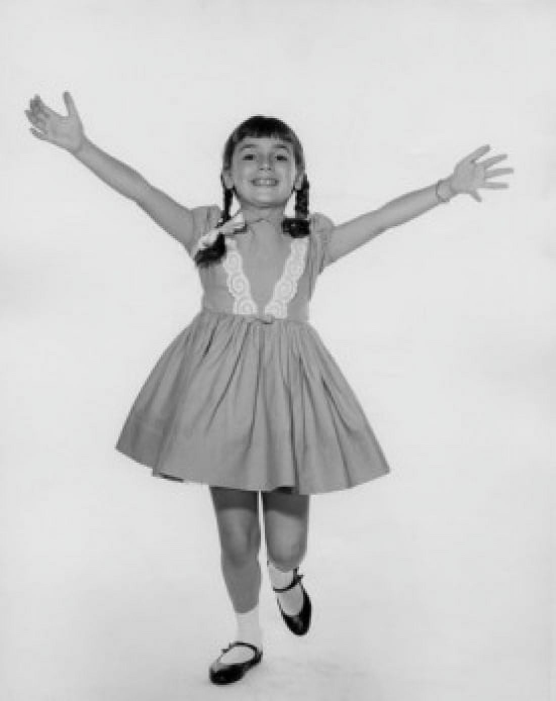 Happy girl with braids raising arms Canvas Art - (18 x 24)