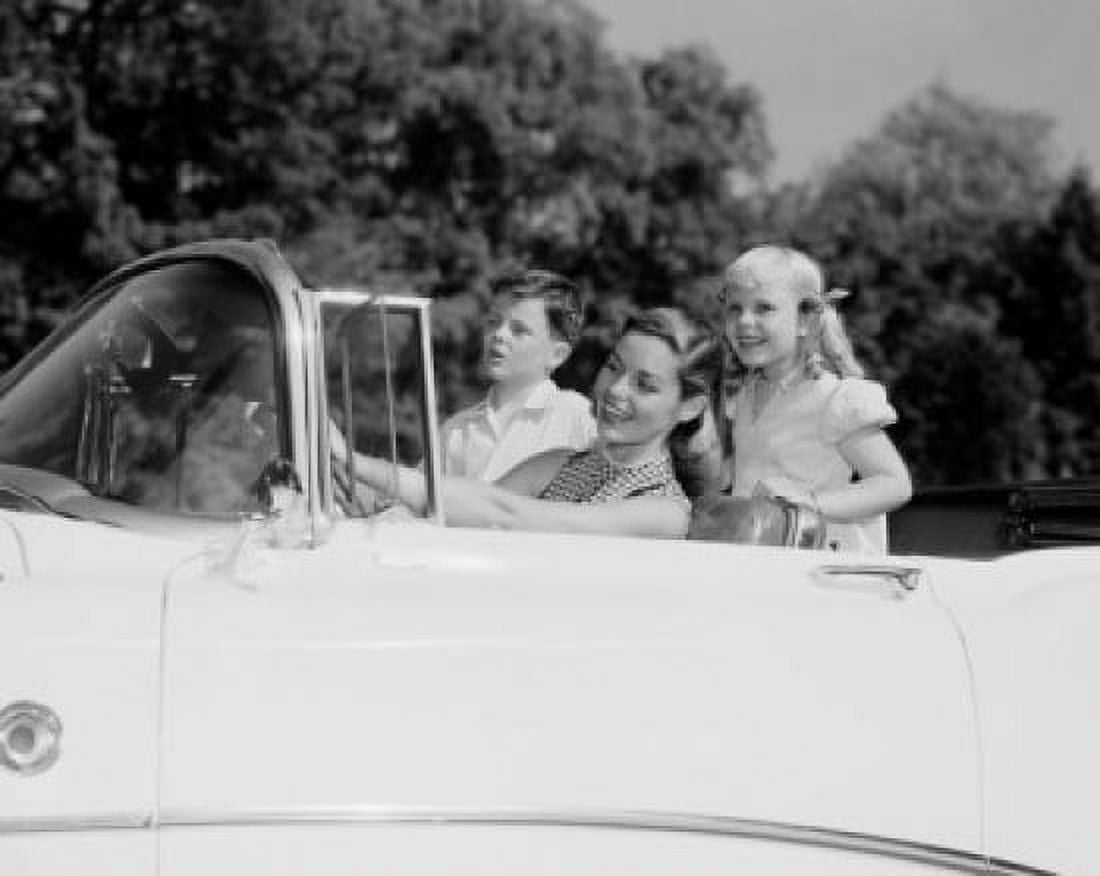 Happy mother with two children in convertible car Canvas Art - (18 x 24)