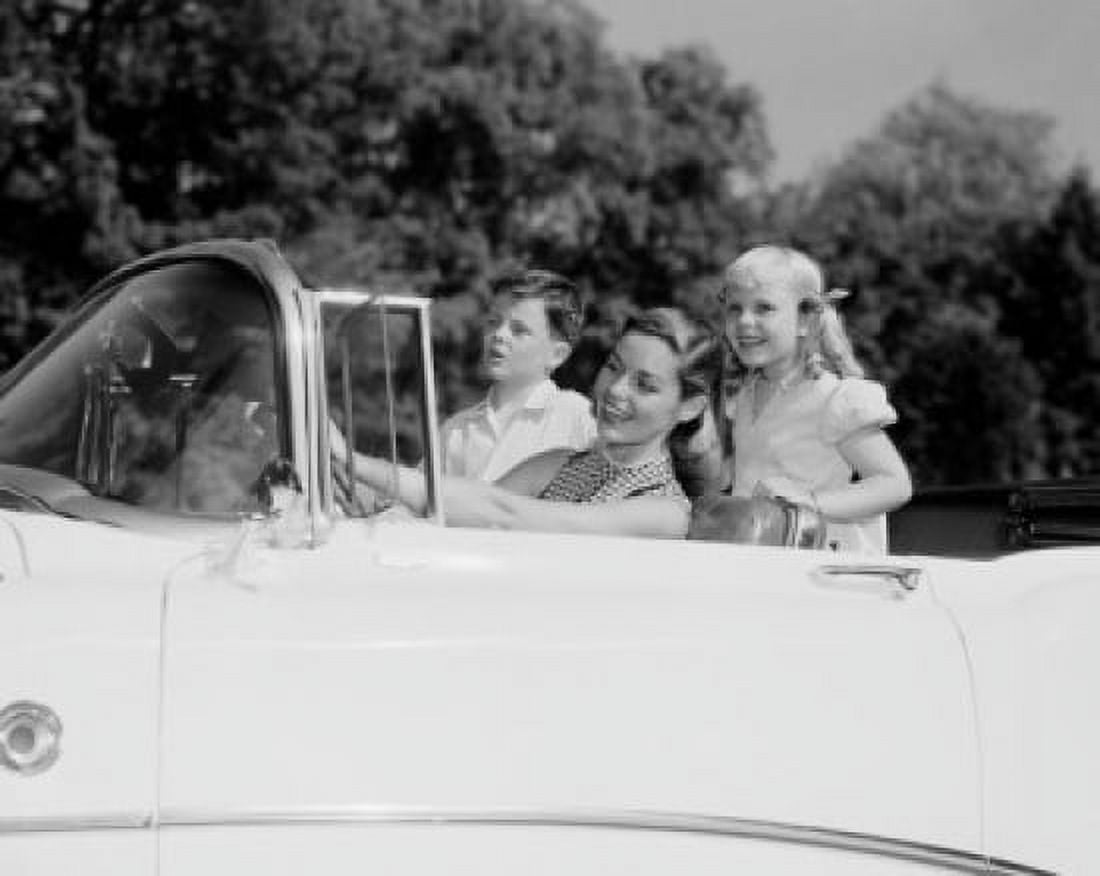 Happy mother with two children in convertible car Canvas Art - (24 x 36)