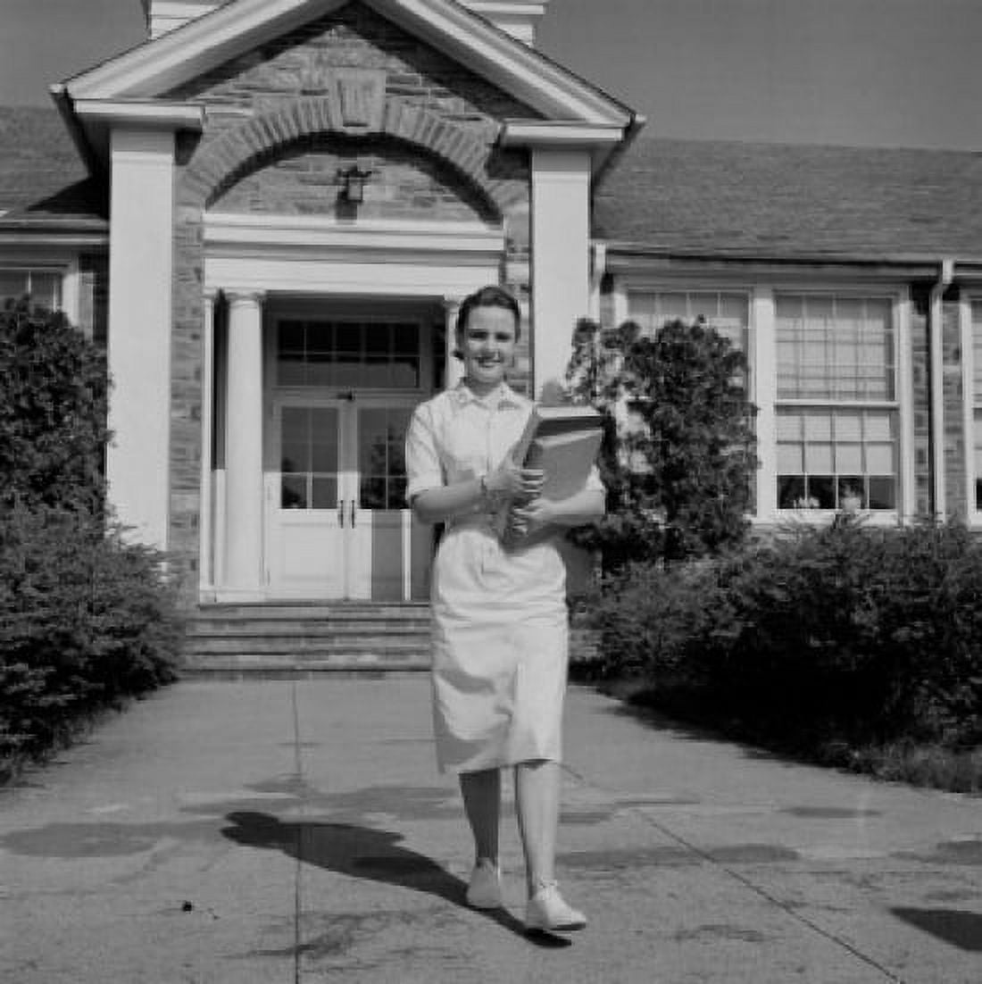 Happy schoolgirl leaving school Canvas Art - (24 x 36)