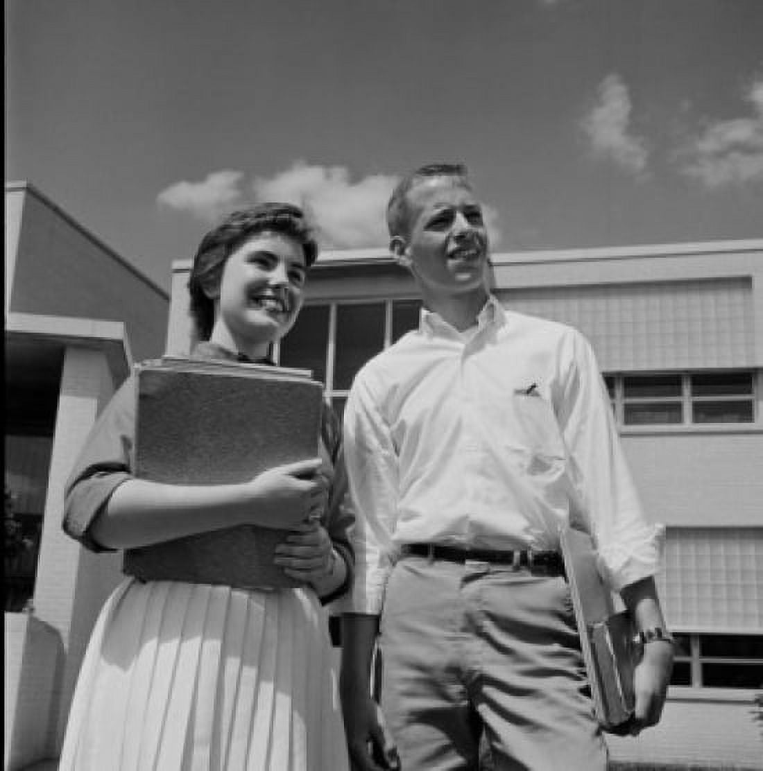 Happy teenage couple in front of school Canvas Art - (18 x 24)