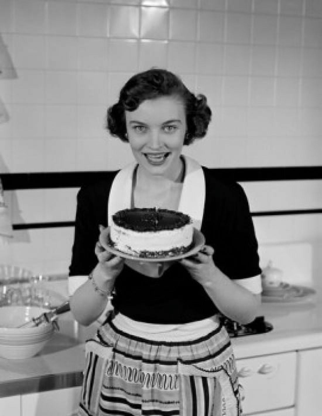 Happy young woman holding layer cake Canvas Art - (24 x 36)