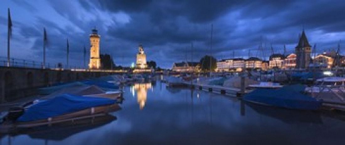 Harbor at dusk Lindau Lake Constance Bavaria Germany Canvas Art - Panoramic Images (15 x 6)