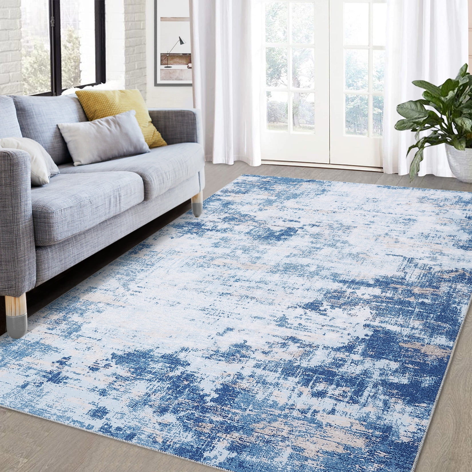 Blue Abstract Washable Synthetic 4' x 6' Area Rug