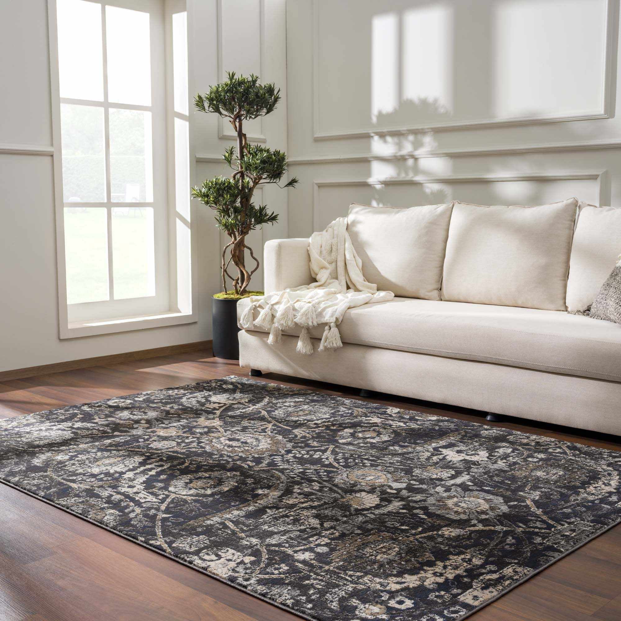 Georgiana Black and Beige Polypropylene Traditional Area Rug 6'4" x 9'