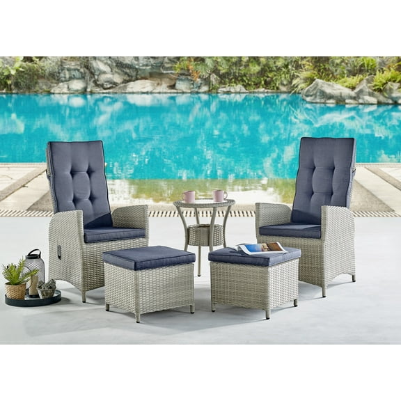 Haven All-Weather Wicker Set of Two Outdoor Recliners with Two Ottomans and Round Glass Top Accent Table