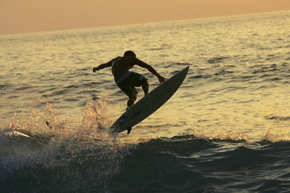 Hawaii Big Island Kona Surfer At Sunset Canvas Art - Jody Watt Design Pics (19 x 12)