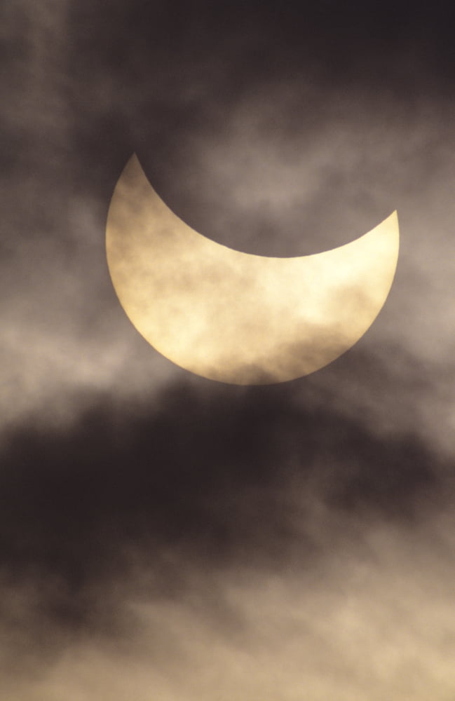 Hawaii July 11 1991 Solar Eclipse Partial With Clouds Canvas Art - Reggie David Design Pics (11 x 17)