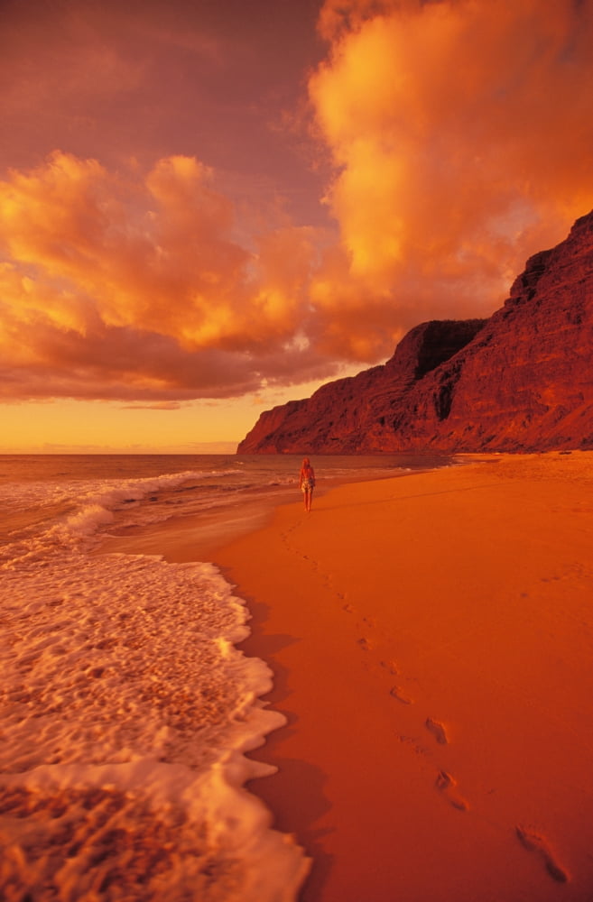 Hawaii Kauai Polihale State Park Beach At Sunset Back View Of Woman Walking Along The Shoreline Canvas Art - Ron Dahlquist  Design Pics (22 x 34)
