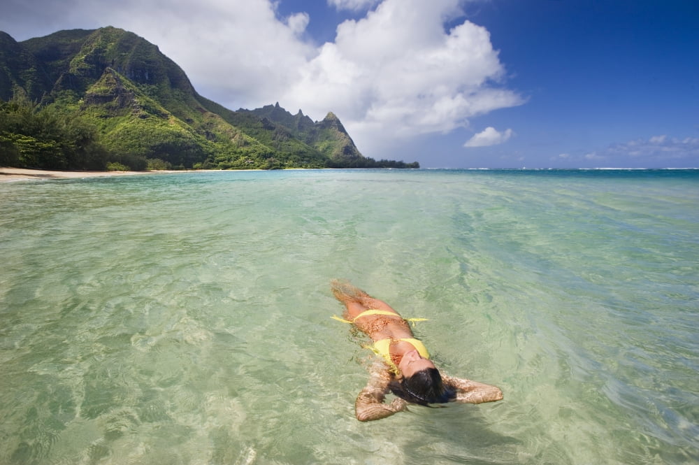 Hawaii KauaiTunnels Beach Woman Floating In The Ocean Canvas Art - M Swiet Productions Design Pics (19 x 12)