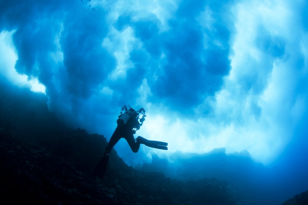 Hawaii Lanai Diver Near Cathedral Underneath A Billowing Wave Canvas Art - Dave Fleetham Design Pics (36 x 24)