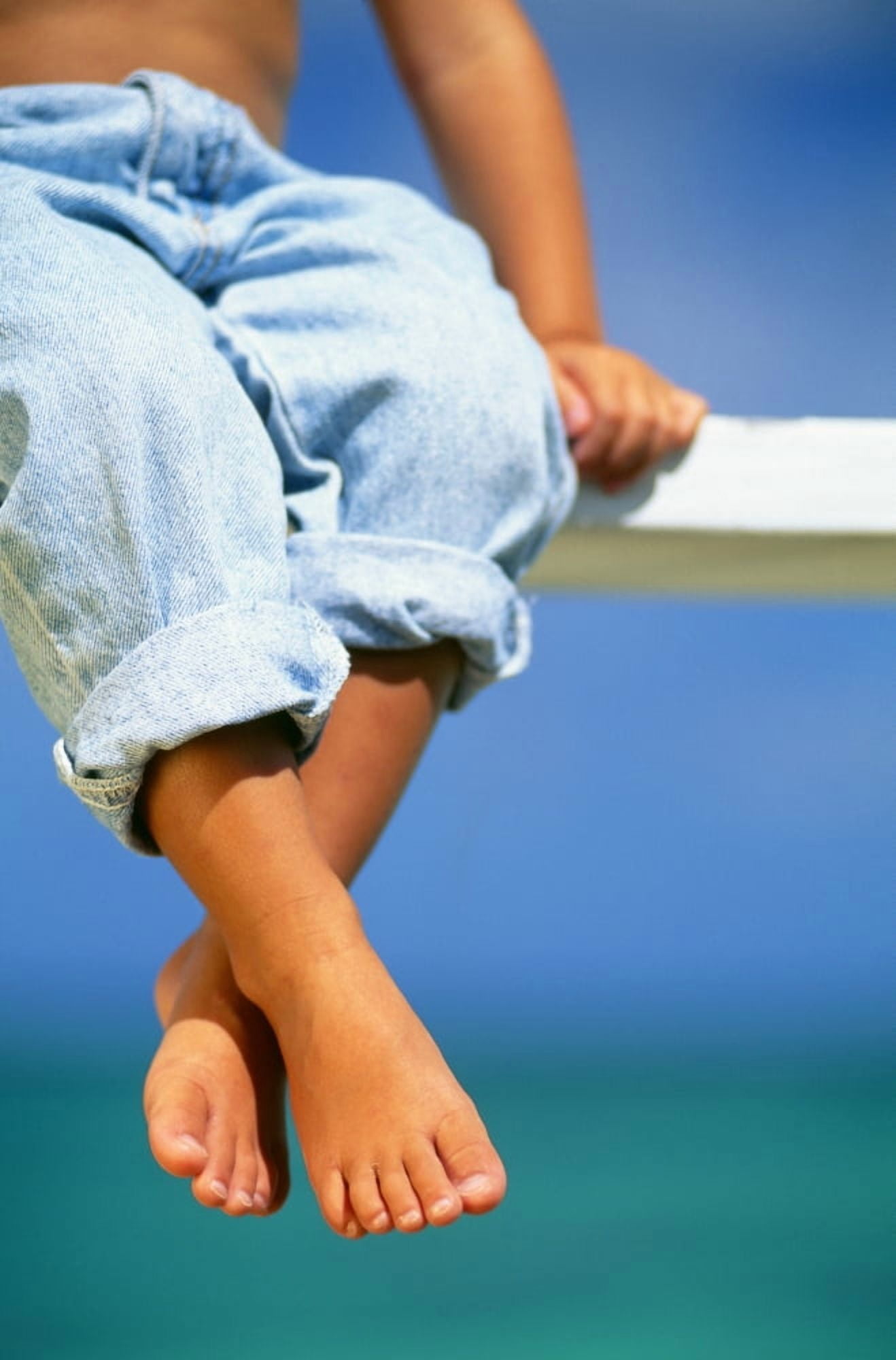 Hawaii Legs And Feet Of Young Boy Sitting On A Bench By The Ocean Canvas Art - Dana Edmunds Design Pics (24 x 38)