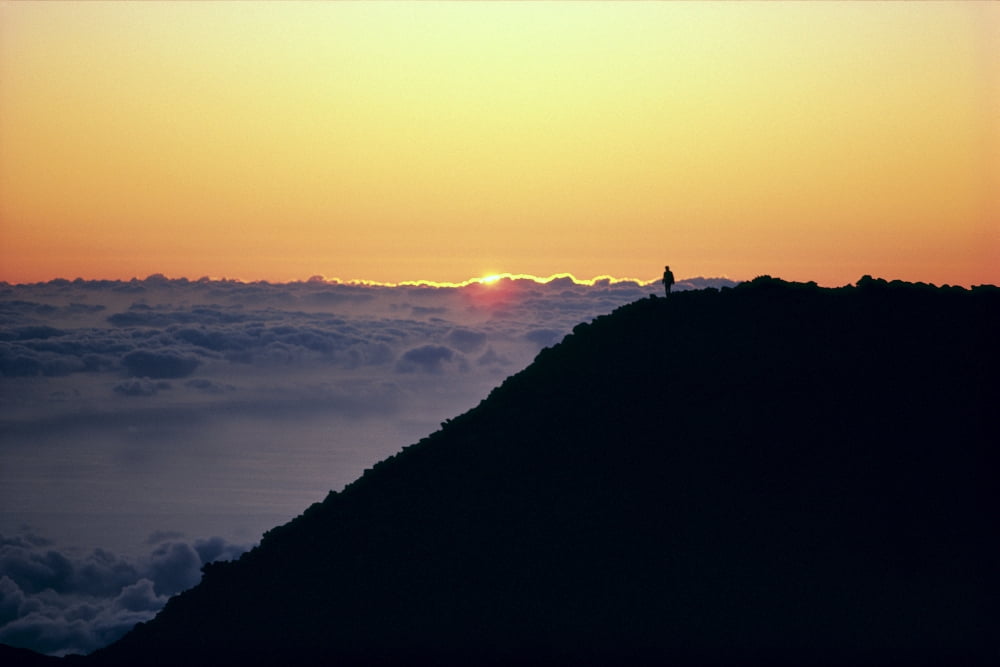 Hawaii Maui Haleakala Crater Person In Distance Watching Sunrise Above Clouds A46D Canvas Art - Dana Edmunds Design Pics (19 x 12)