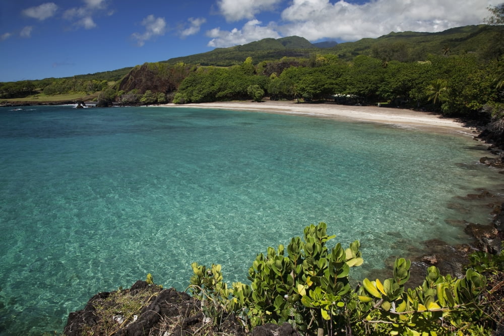 Hawaii Maui Hana A sunny view of Hamoa Beach with clear ocean on a calm day Canvas Art - Jenna Szerlag Design Pics (38 x 24)