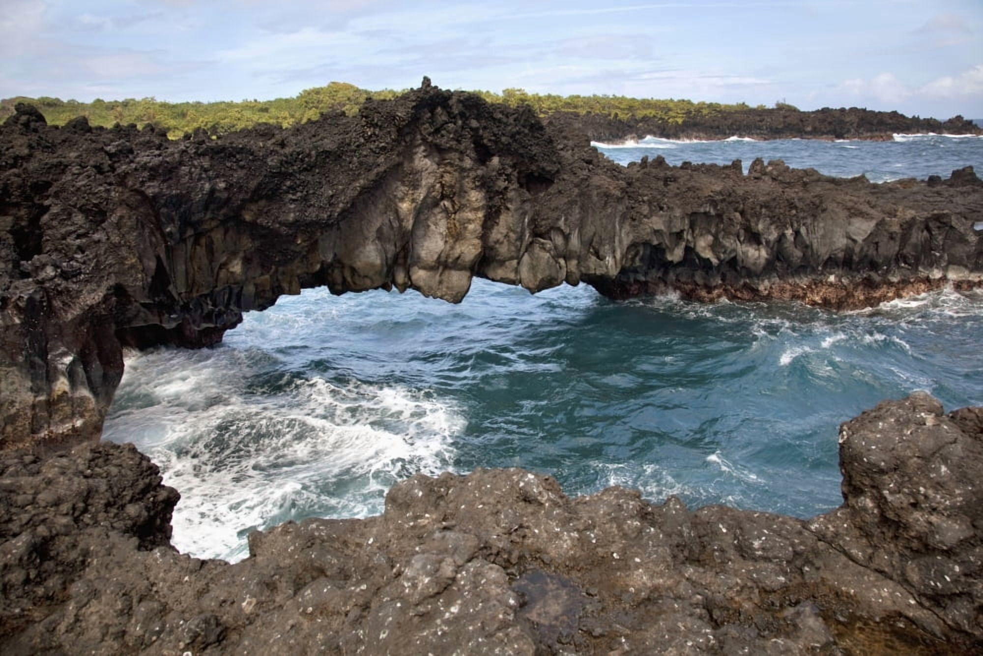 Hawaii Maui Hana Lava rock formation arches over ocean Canvas Art - Jenna Szerlag Design Pics (18 x 12)