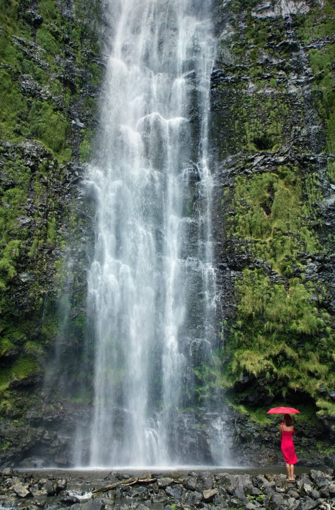 Hawaii Maui Kipahulu Hana Woman Stands With Umbrella At The Base Of Waterfall Canvas Art - M Swiet Productions Design Pics (24 x 36)