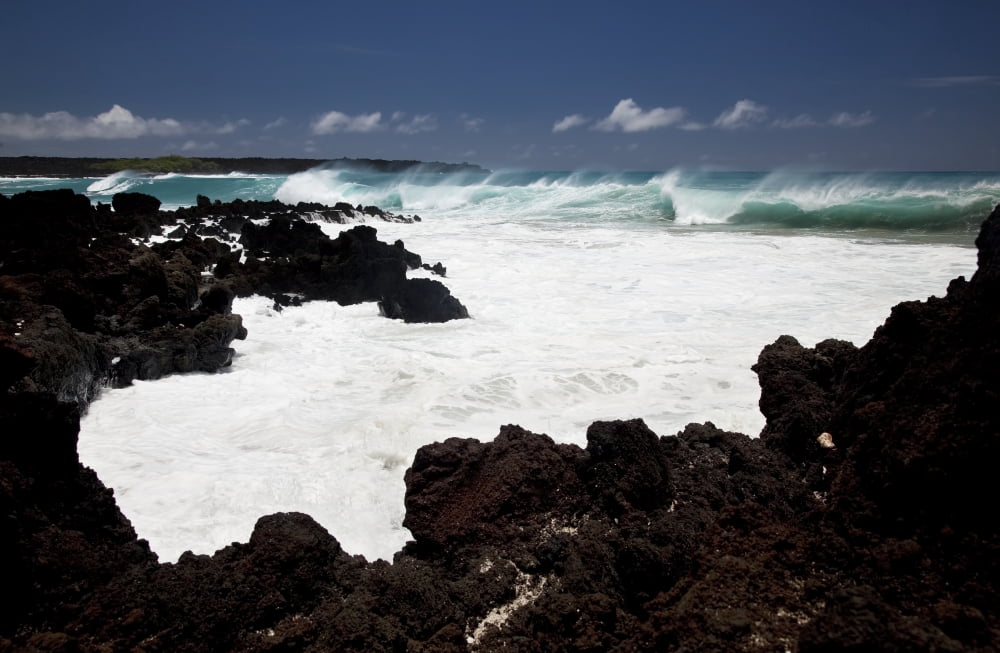 Hawaii Maui La Perouse A wave breaks with lave rocks in the foreground Canvas Art - Jenna Szerlag Design Pics (19 x 12)