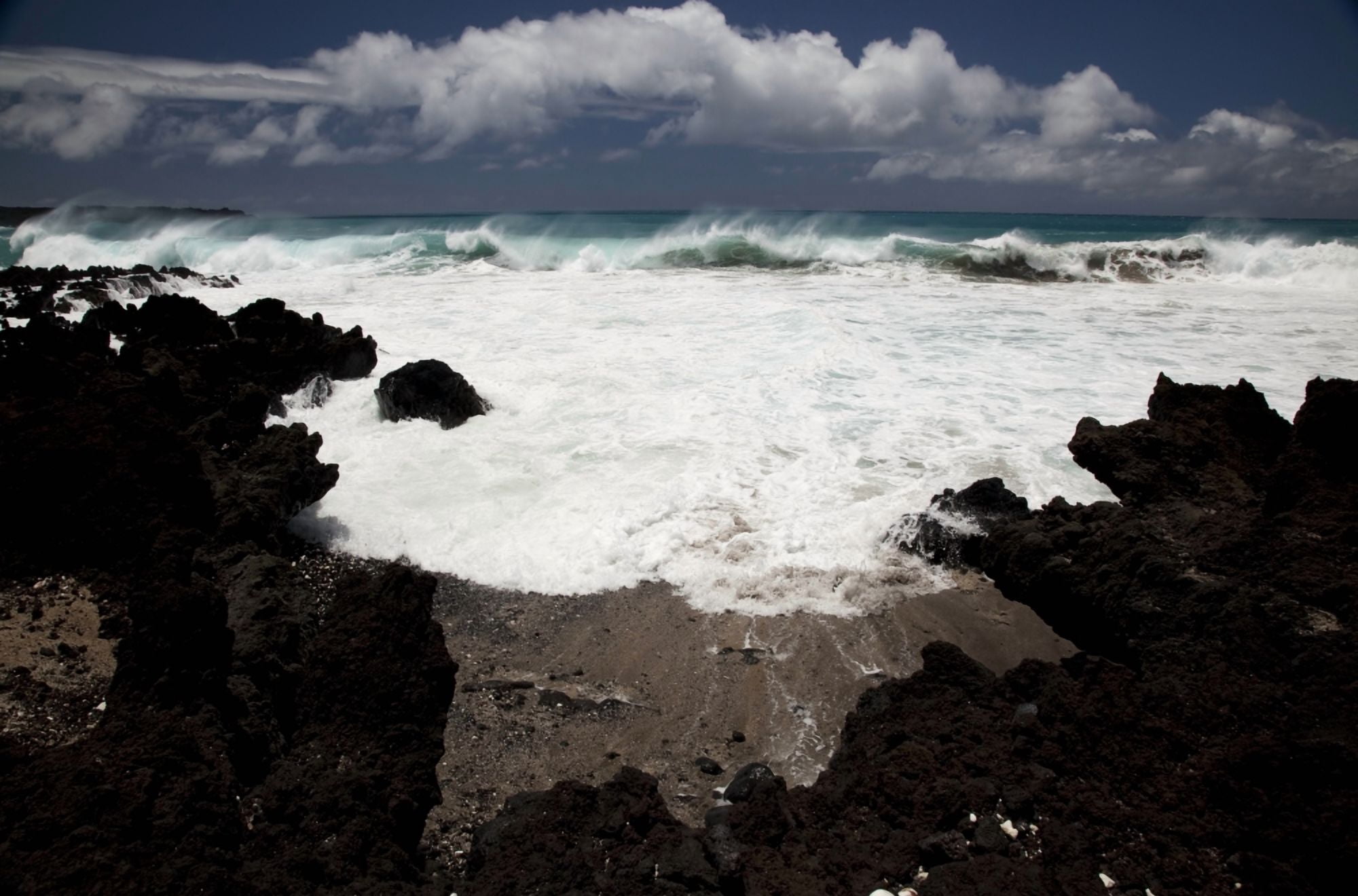Hawaii Maui La Perouse A wave breaks with lave rocks in the foreground Canvas Art - Jenna Szerlag Design Pics (19 x 12)