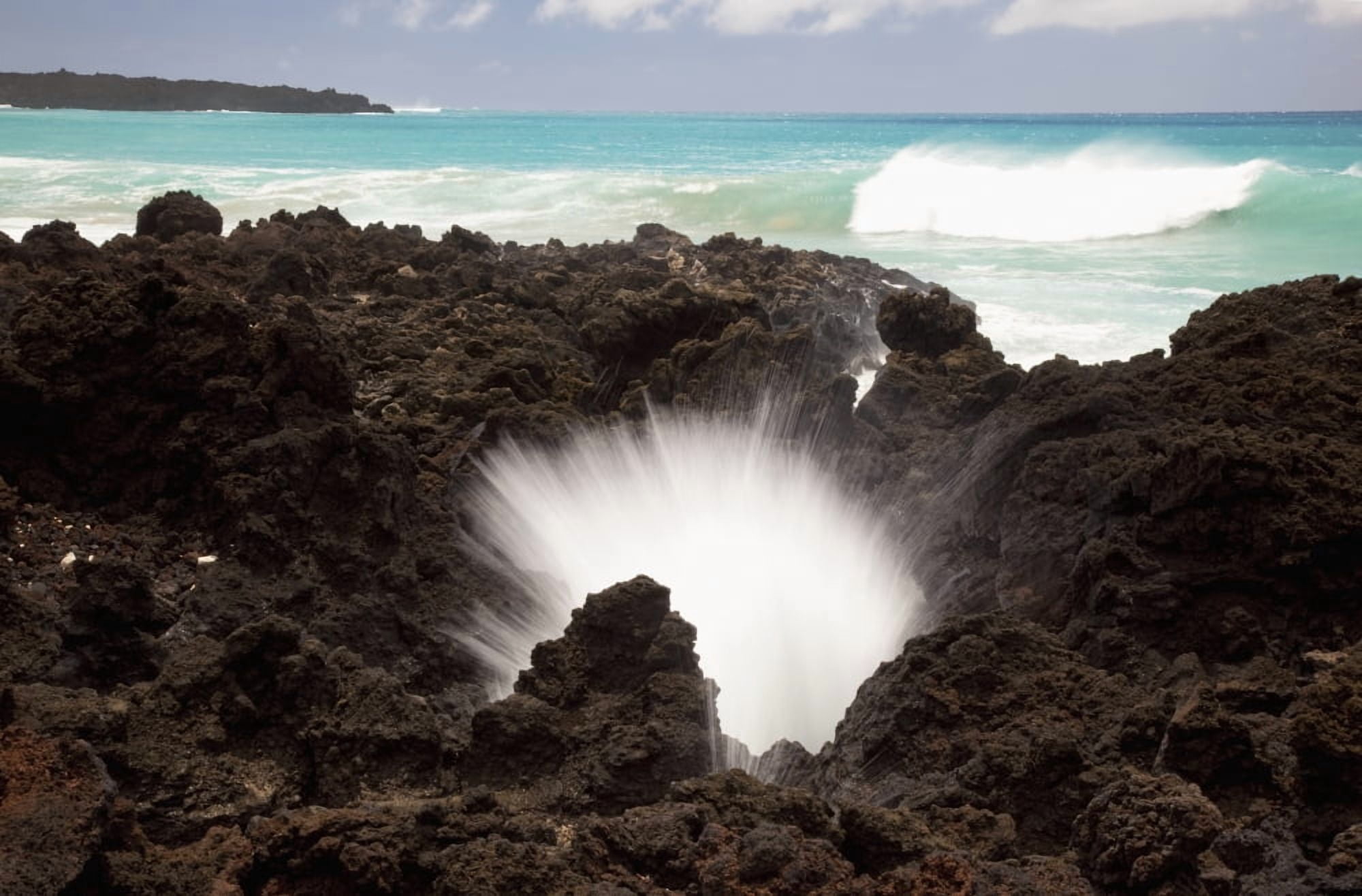 Hawaii Maui La Perouse Bay A burst of water through a blowhole in some lava rocks Canvas Art - Jenna Szerlag Design Pics (19 x 12)