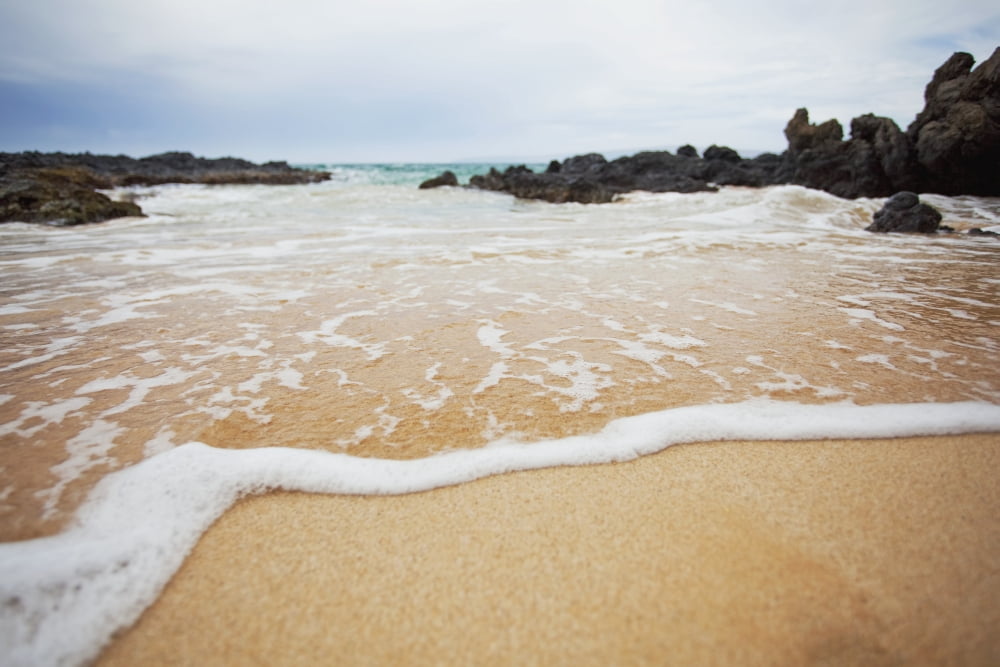 Hawaii Maui Makena A closeup of the ocean over sand Canvas Art - Jenna Szerlag Design Pics (19 x 12)