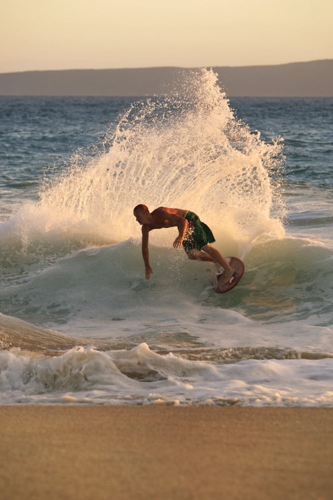 Hawaii Maui Makena Skimboarder Carves Big Turn On Wave At Sunset Canvas Art - MakenaStockMedia Design Pics (24 x 36)