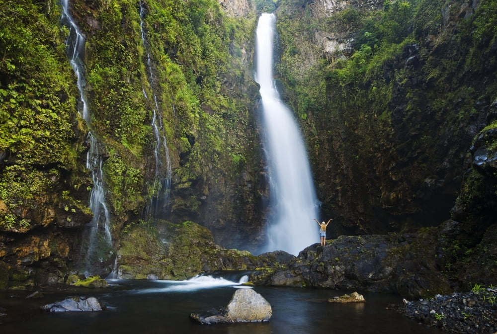 Hawaii Maui Nahiku Woman Standing At Base Of Hanawi Falls Canvas Art - MakenaStockMedia Design Pics (34 x 22)