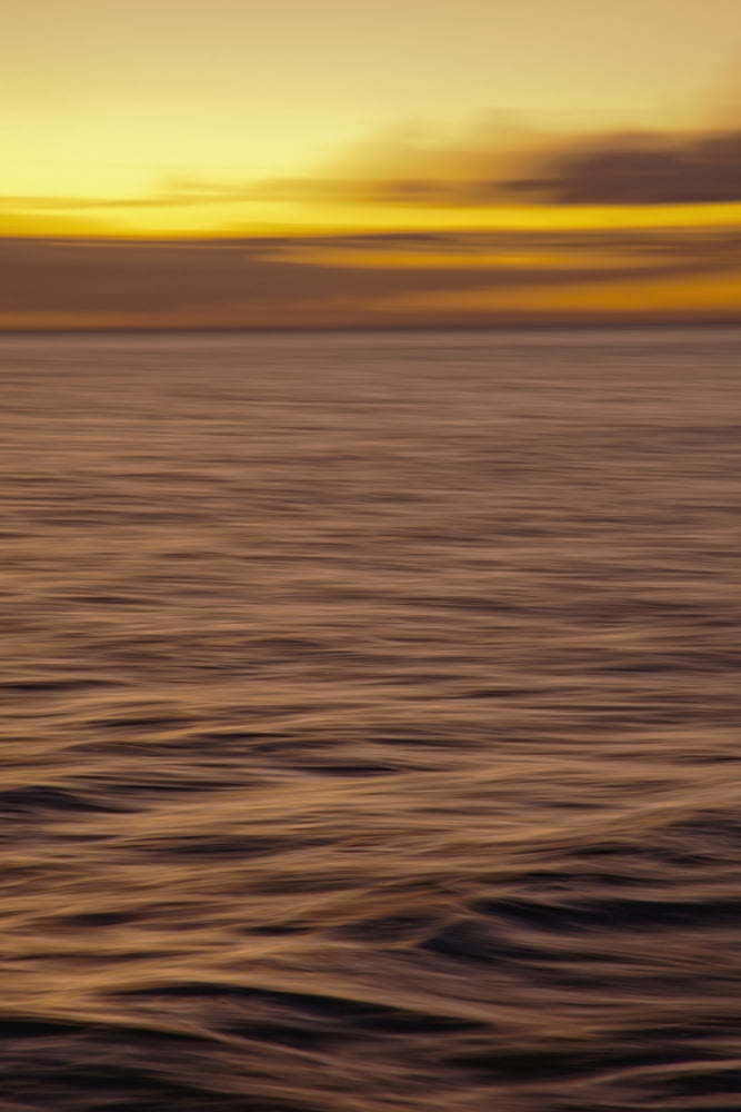 Hawaii Maui Ocean waves in motion and a vibrant tropical sunset Canvas Art - Dave Fleetham Design Pics (12 x 19)