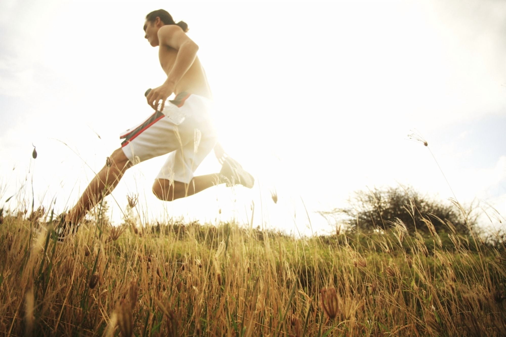 Hawaii Oahu Atheltic Male Jogging On An Outdoor Field Walkway Path Canvas Art - Brandon Tabiolo Design Pics (17 x 11)