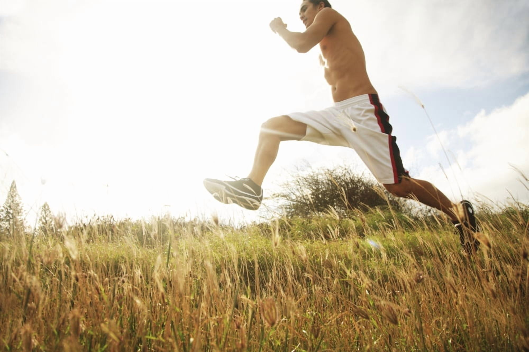 Hawaii Oahu Atheltic Male Jogging On An Outdoor Field Walkway Path Canvas Art - Brandon Tabiolo Design Pics (17 x 11)