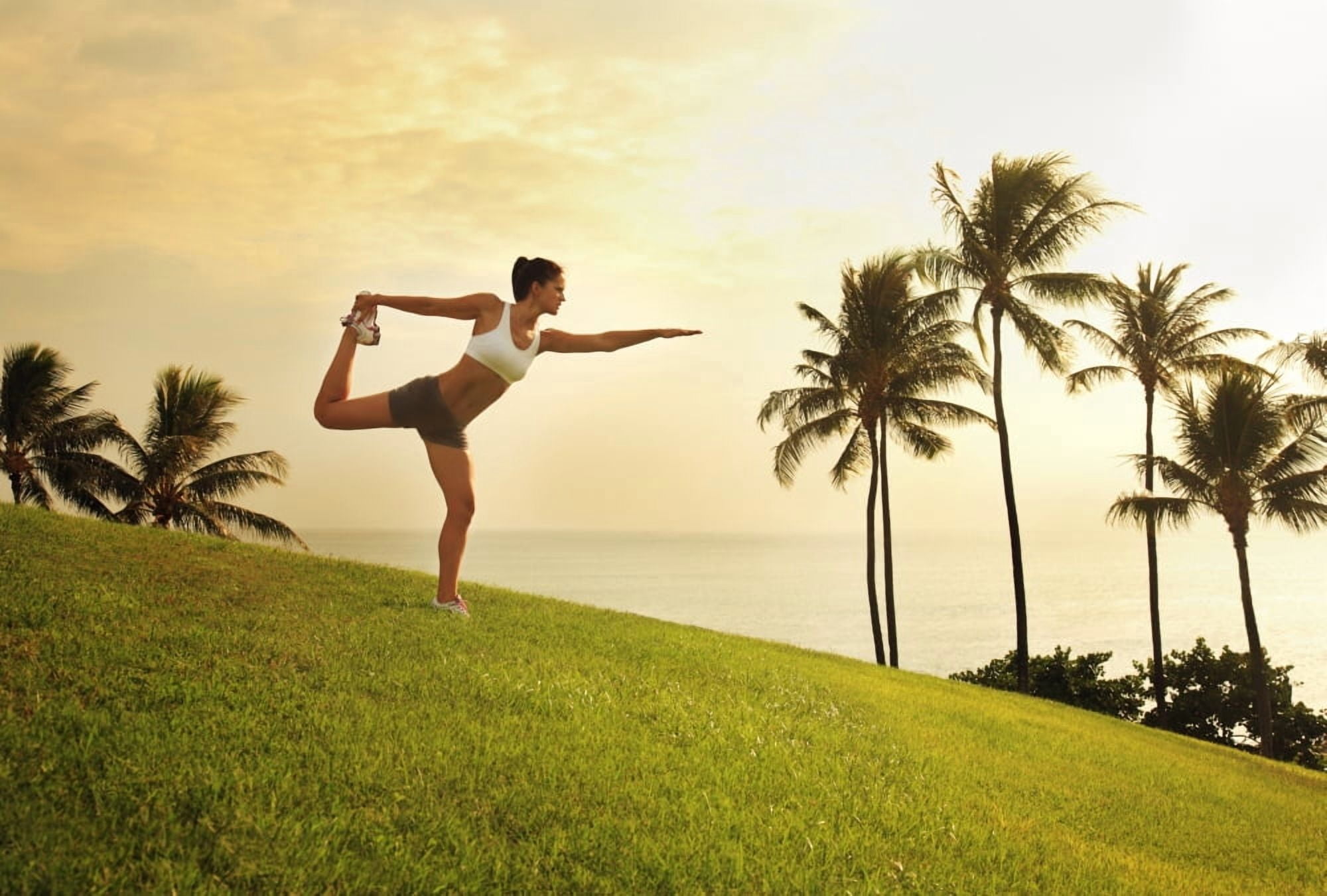 Hawaii Oahu Female Doing A Yoga Pose Stretching On A Hill Overlooking Ocean Palm Trees And Sunset Canvas Art - Brandon Tabiolo Design Pics (34 x 22)