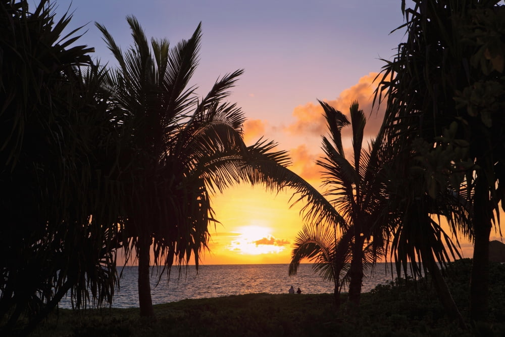 Hawaii Oahu Kailua Lanikai Vibrant sunset with a couple on beach Canvas Art - Tomas del Amo Design Pics (38 x 24)