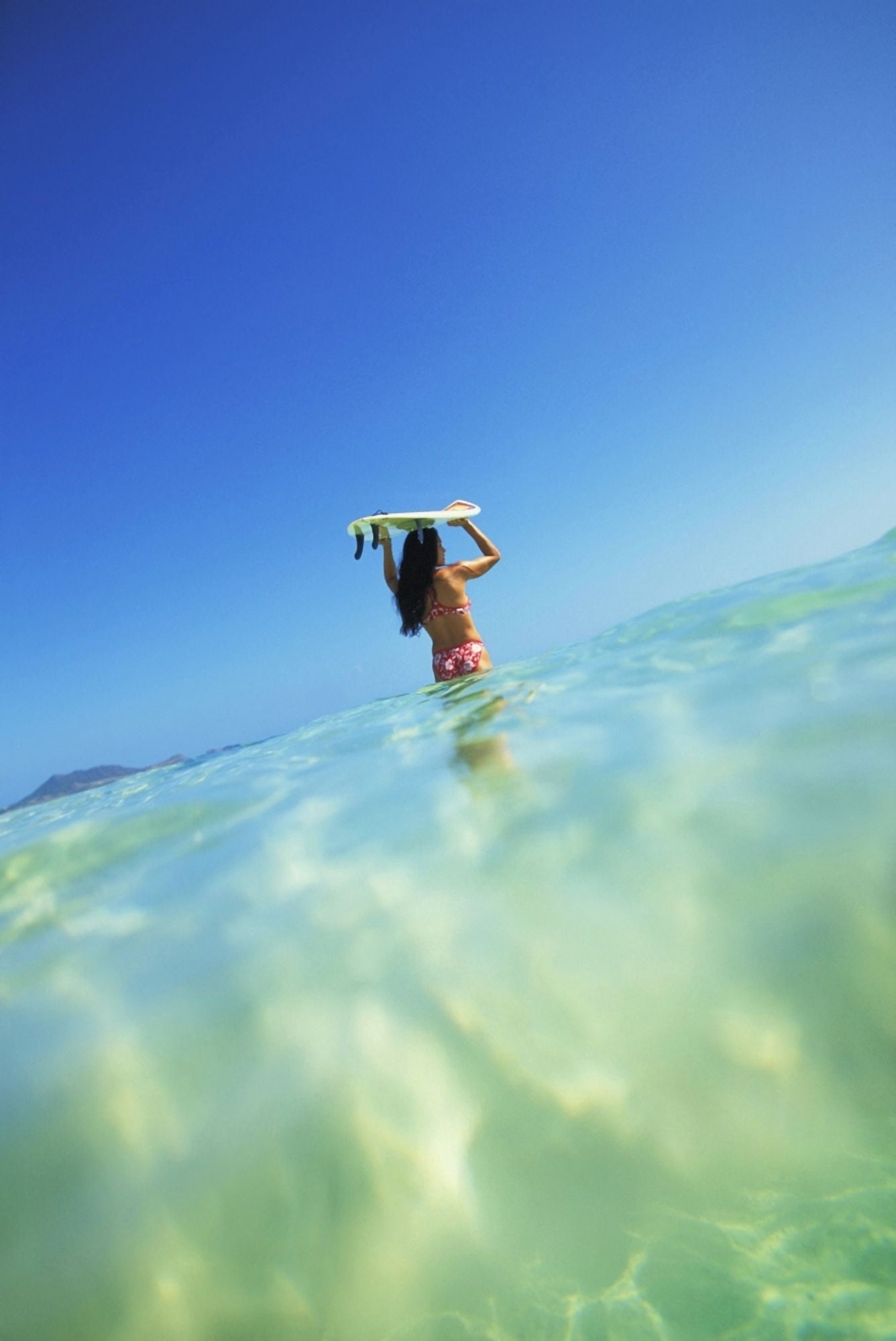Hawaii Oahu Lanikai Beach OverUnder View Of Woman Holding Surfboard On Head Canvas Art - Dana Edmunds Design Pics (11 x 17)