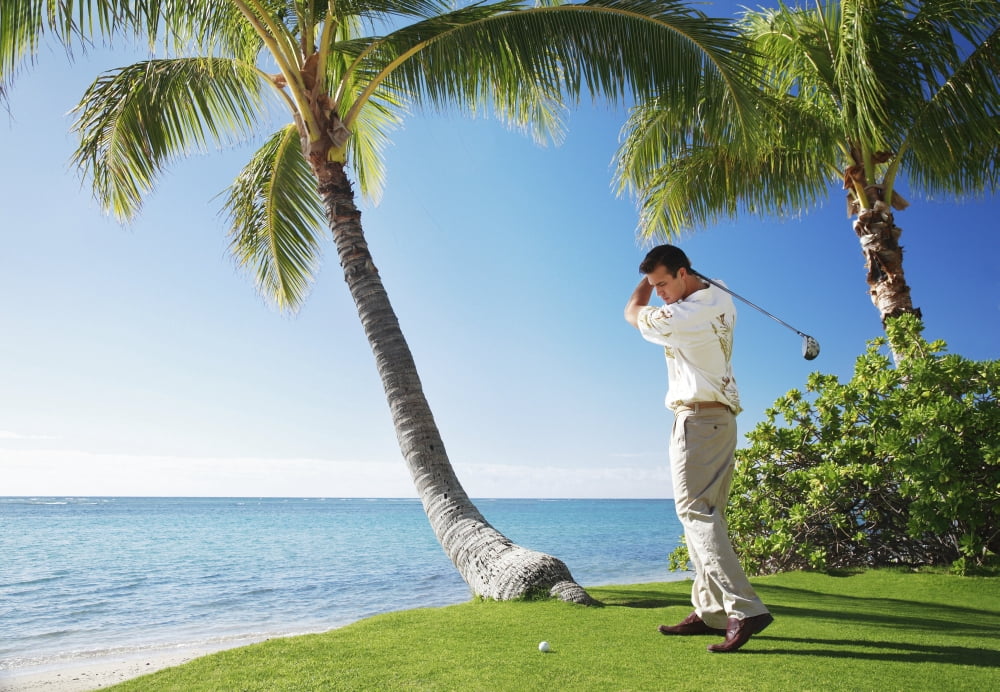 Hawaii Oahu Male Playing Golf Ready To Swing His Golf Club At A Beach Front Golf Course Canvas Art - Brandon Tabiolo Design Pics (32 x 22)