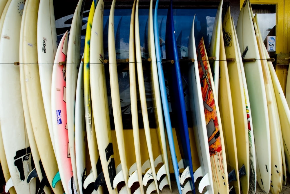 Hawaii Oahu North Shore Haleiwa row of surfboards outside of a surfshop Canvas Art - Ray Laskowitz Design Pics (34 x 22)