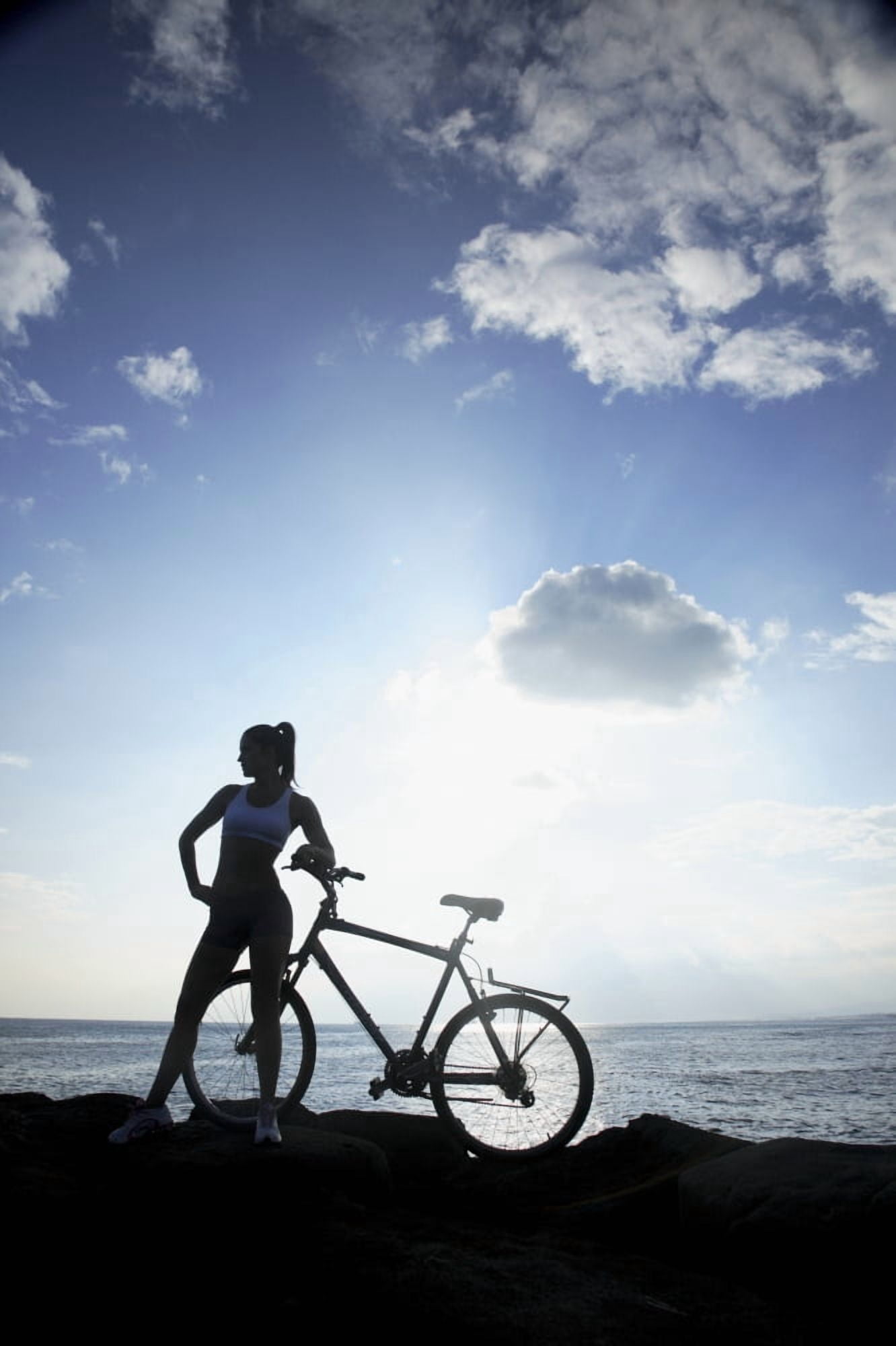 Hawaii Oahu Silhouette Of A Woman With A Bike On A Rocky Coastline Canvas Art - Brandon Tabiolo Design Pics (11 x 17)