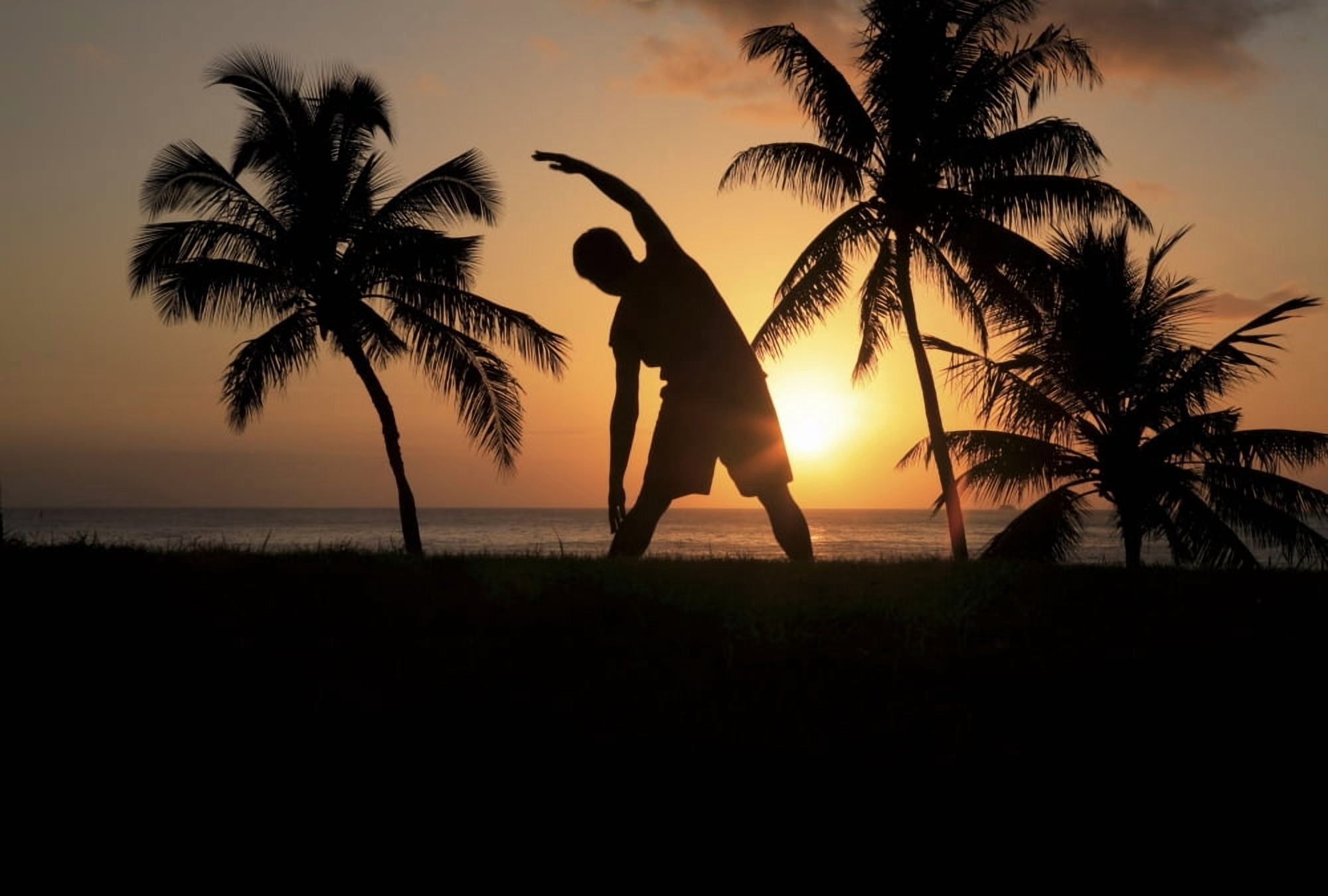 Hawaii Oahu Silhouette Of Man Stretching Near The Beach As The Golden Sunsets Canvas Art - Brandon Tabiolo Design Pics (34 x 22)