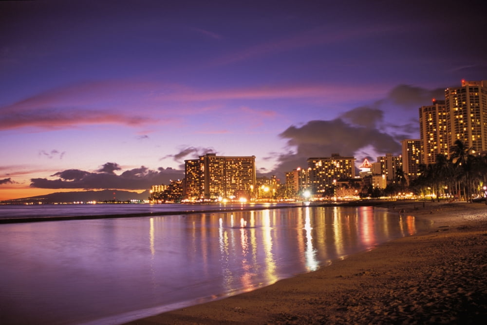 Hawaii Oahu Waikiki Beach Reflection Of City Lights On The Ocean At Twilight Canvas Art - Peter French Design Pics (17 x 11)