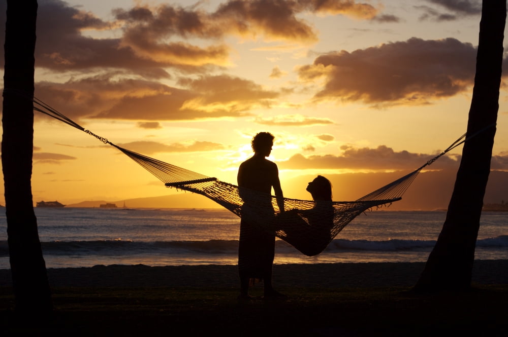 Hawaii Oahu Waikiki Kapiolani Park Silhouette Of Woman In Hammock And Man Standing Next To Her Canvas Art - Larry Dale Gordon Design Pics (34 x 22)