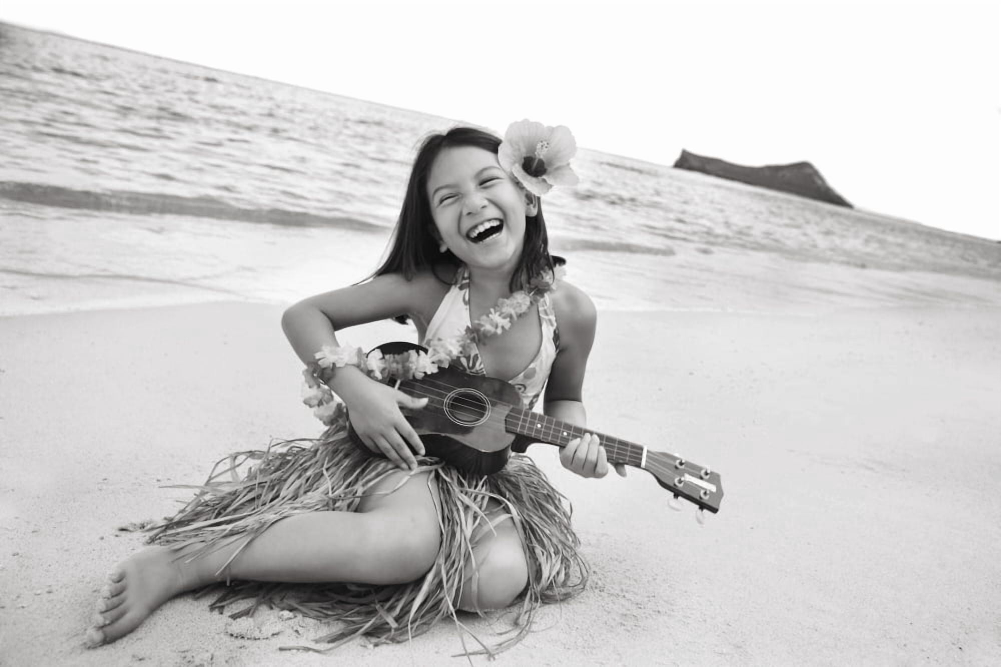Hawaii Oahu Young Girl Smiling And Playing Ukulele On The Beach In A Hula Skirt Canvas Art - Brandon Tabiolo Design Pics (34 x 22)
