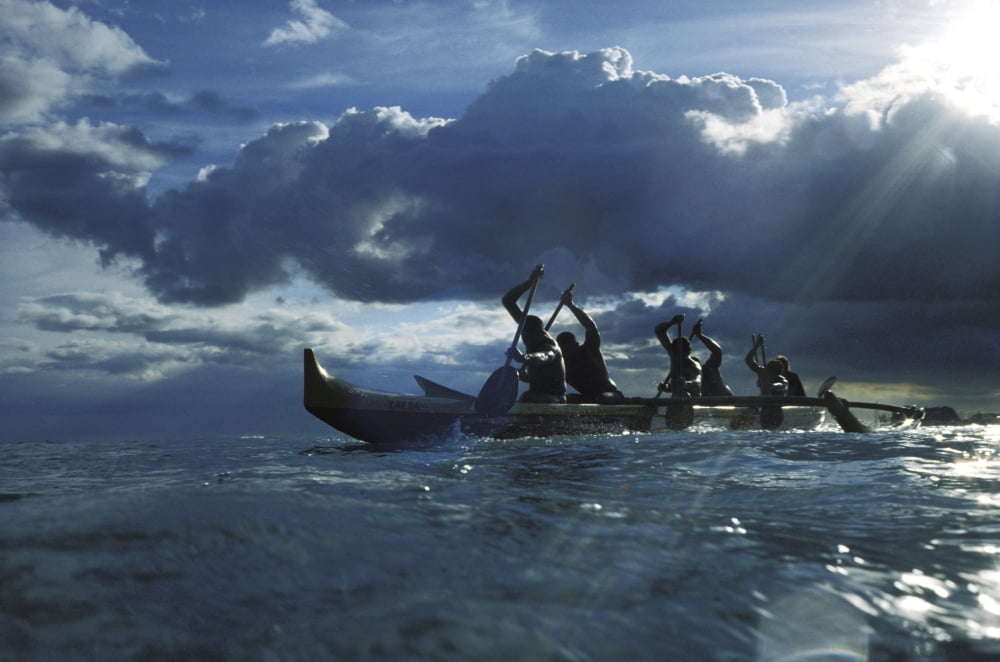 Hawaii Ourigger Canoe Paddlers At Sunset Rays Of Light Break Through Dramatic Sky Canvas Art - Chris Abraham Design Pics (17 x 11)