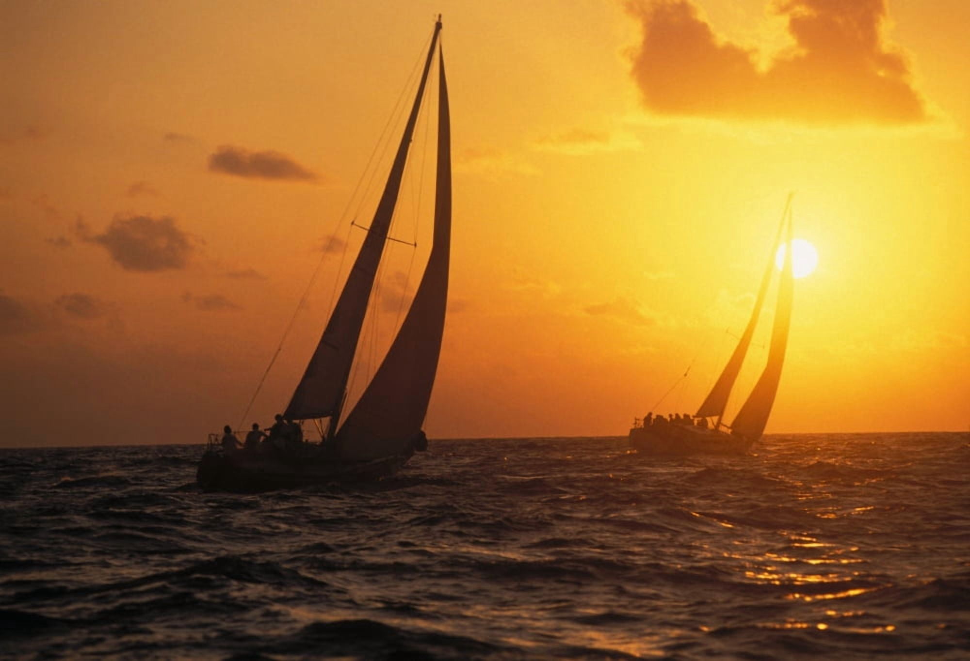 Hawaii Two Sailboats Silhouetted At Sunset Yellow And Orange Skies Canvas Art - Chris Abraham Design Pics (32 x 22)