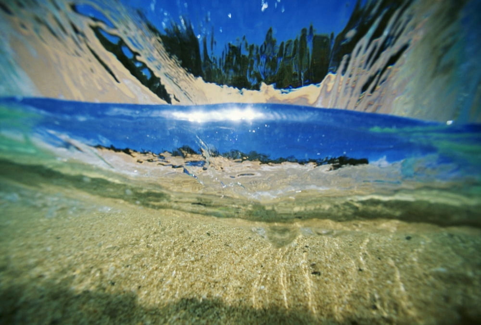 Hawaii Underwater Breaking Wave Sand Sky And Trees Visible Through Clear Water Canvas Art - Vince Cavataio Design Pics (38 x 24)